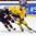 HELSINKI, FINLAND - DECEMBER 28: Sweden's Jacob Larsson #4 stickhandles the puck with pressure from USA's Nick Schmaltz #9 during preliminary round action at the 2016 IIHF World Junior Championship. (Photo by Matt Zambonin/HHOF-IIHF Images)

